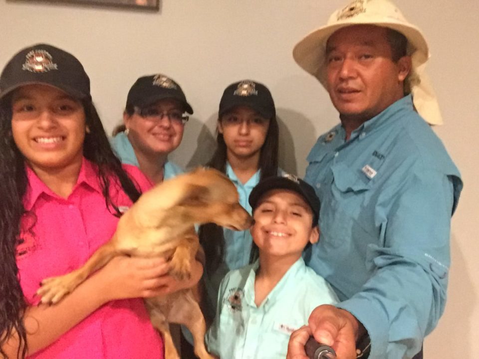 Ignacio Gomez with his family in the yard of their Lehigh Acres home
